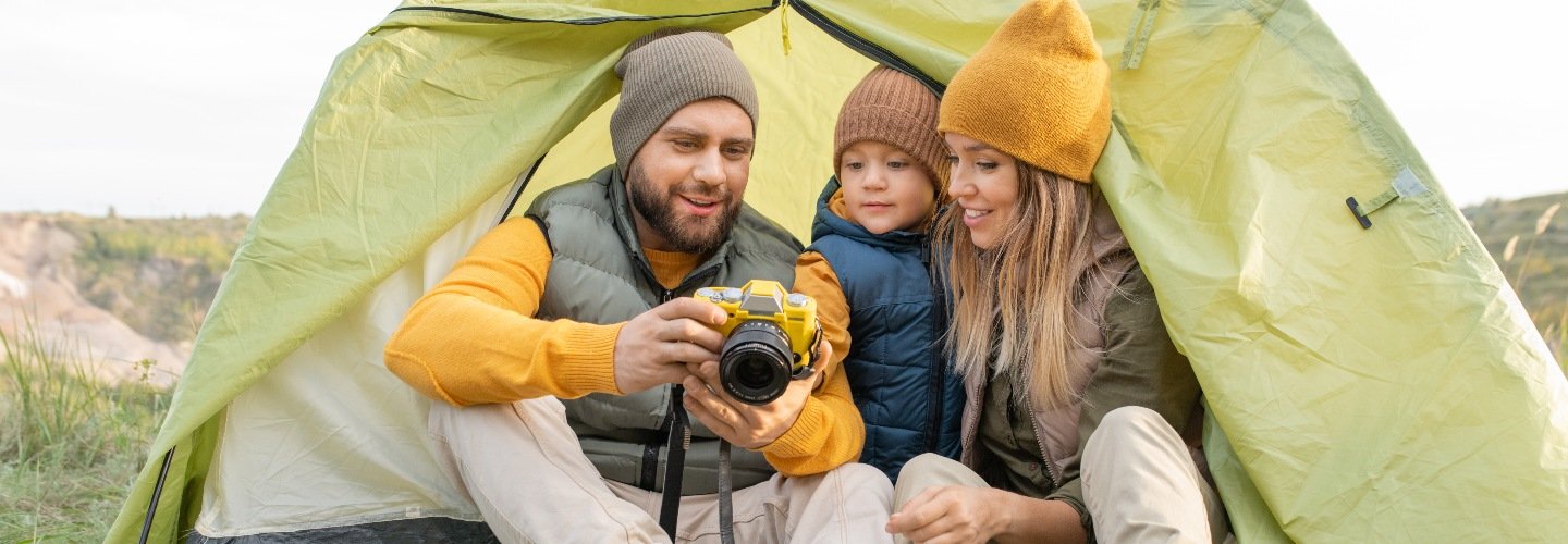 family camping with camera 